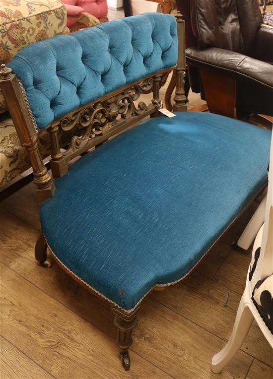 A small Victorian gilt and upholstered settee, W.100cm